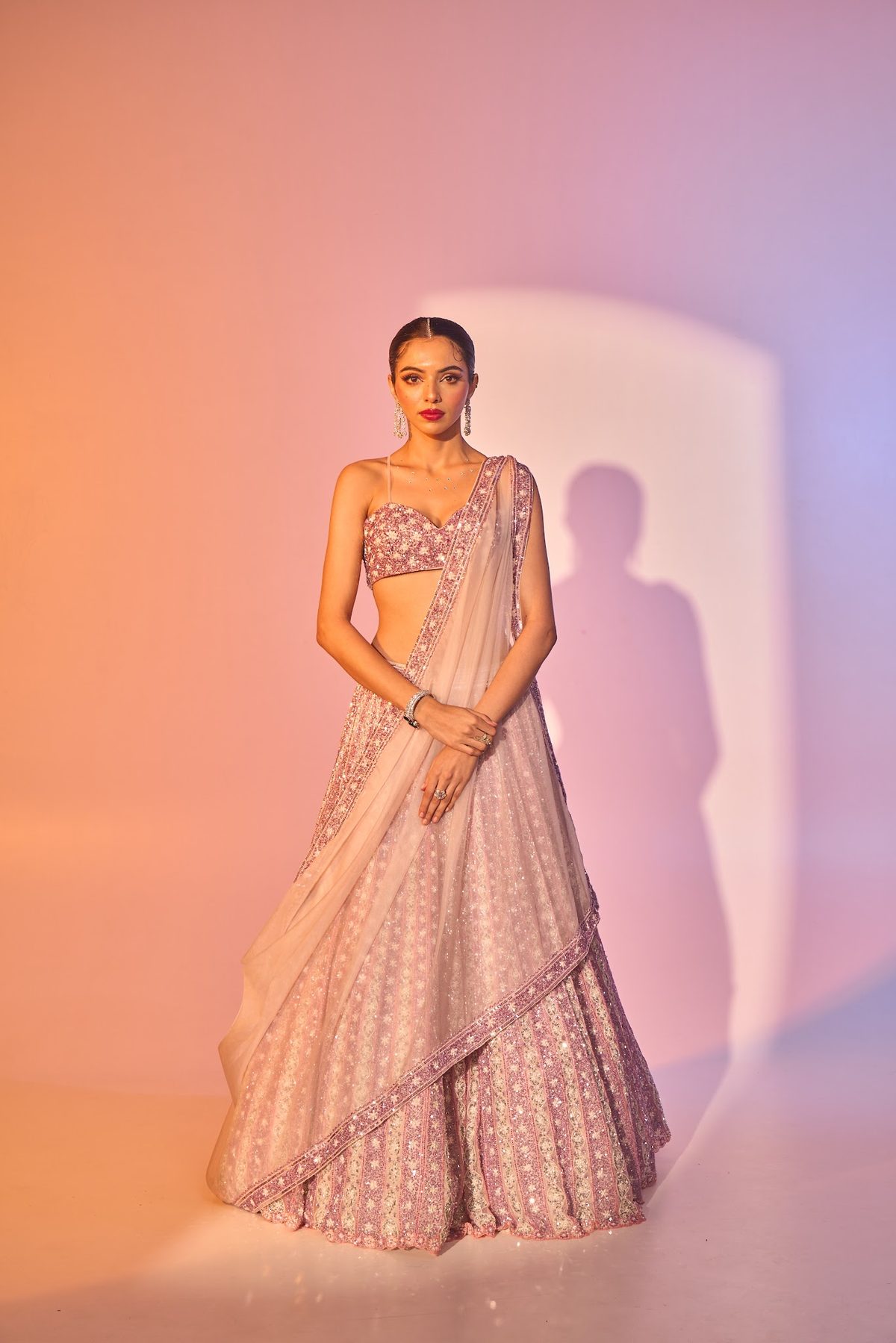 Sea Side Whispers lookbook — Soft Pink Coral, Reef Bloom: A soft-pink bustier blouse with a hand-embroidered coral-inspired lehenga and dupatta set.