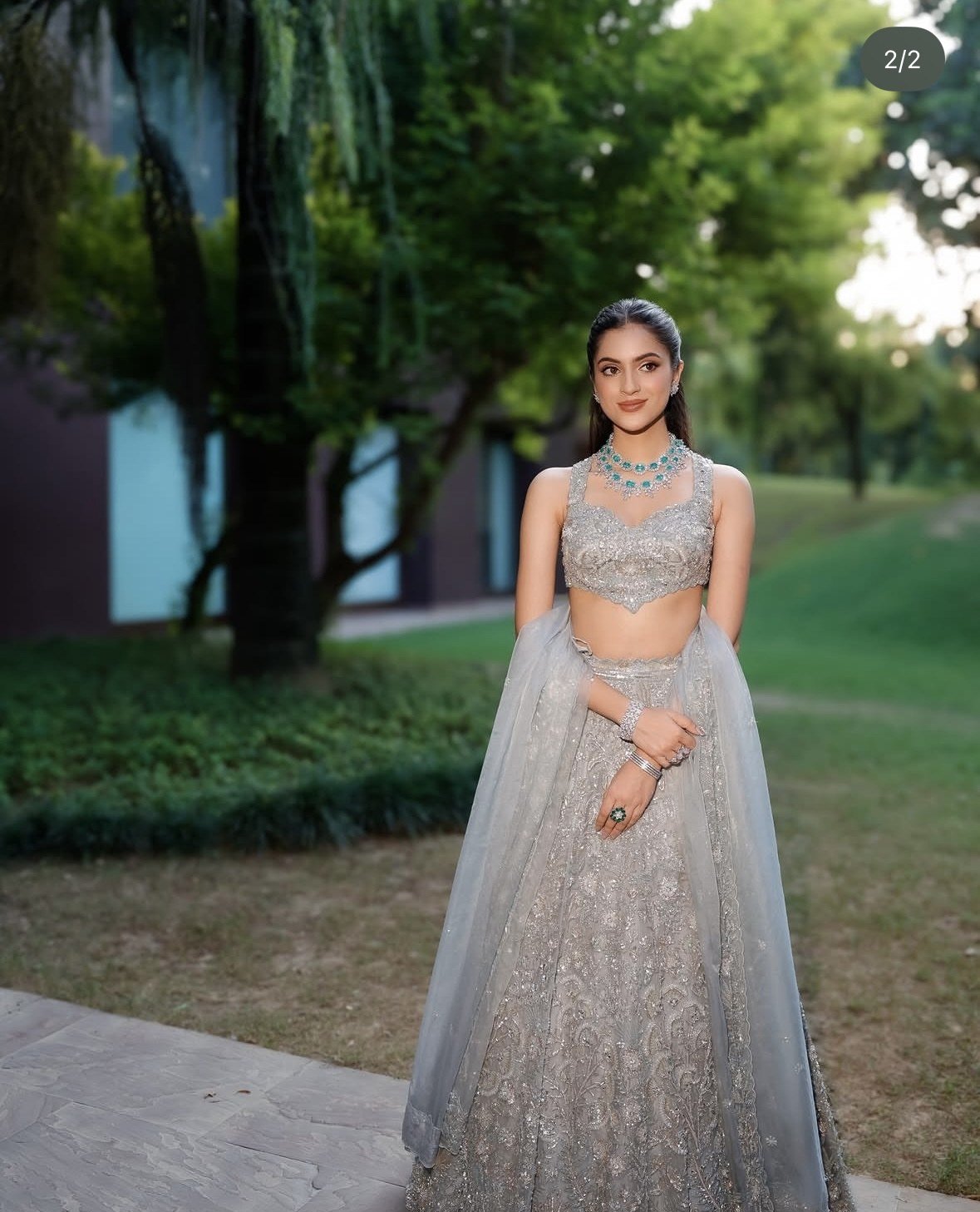 Scarlet Rose lookbook — Dusty Blue Lehenga Set, Dusty Blue · Bridal Lehenga: A dusty-blue lehenga set worked all over in silver zardozi, with a scalloped sweetheart blouse.