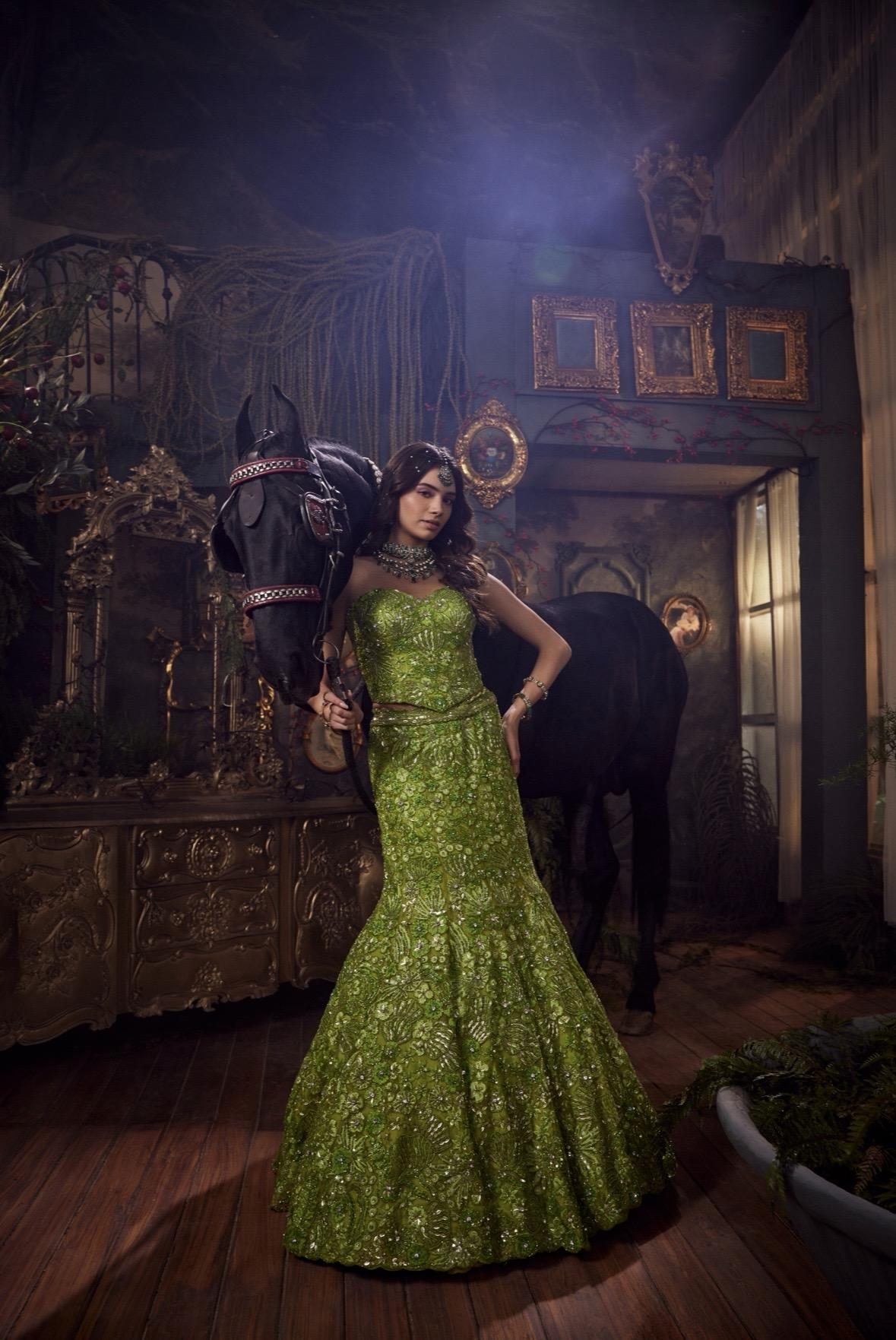 Phool Bahar lookbook — Venom, Green Zest: A sculpted silhouette in green zest, hand-embroidered with luminous detailing that cascades into a dramatic, fluid trail.