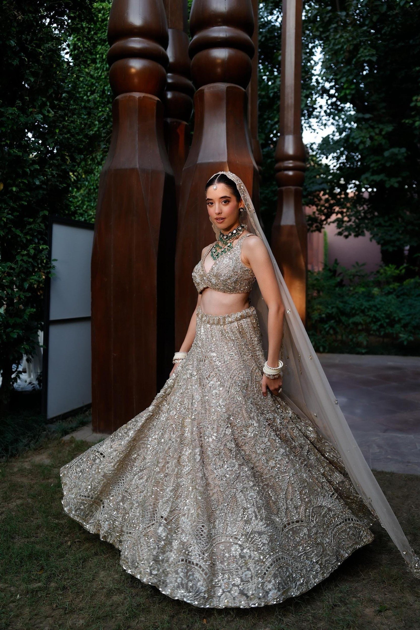 Scarlet Rose lookbook — Golden Lehenga Set, Golden · Bridal Lehenga: Antique gold from waist to hem, styled with the dupatta drawn over the head like a veil.