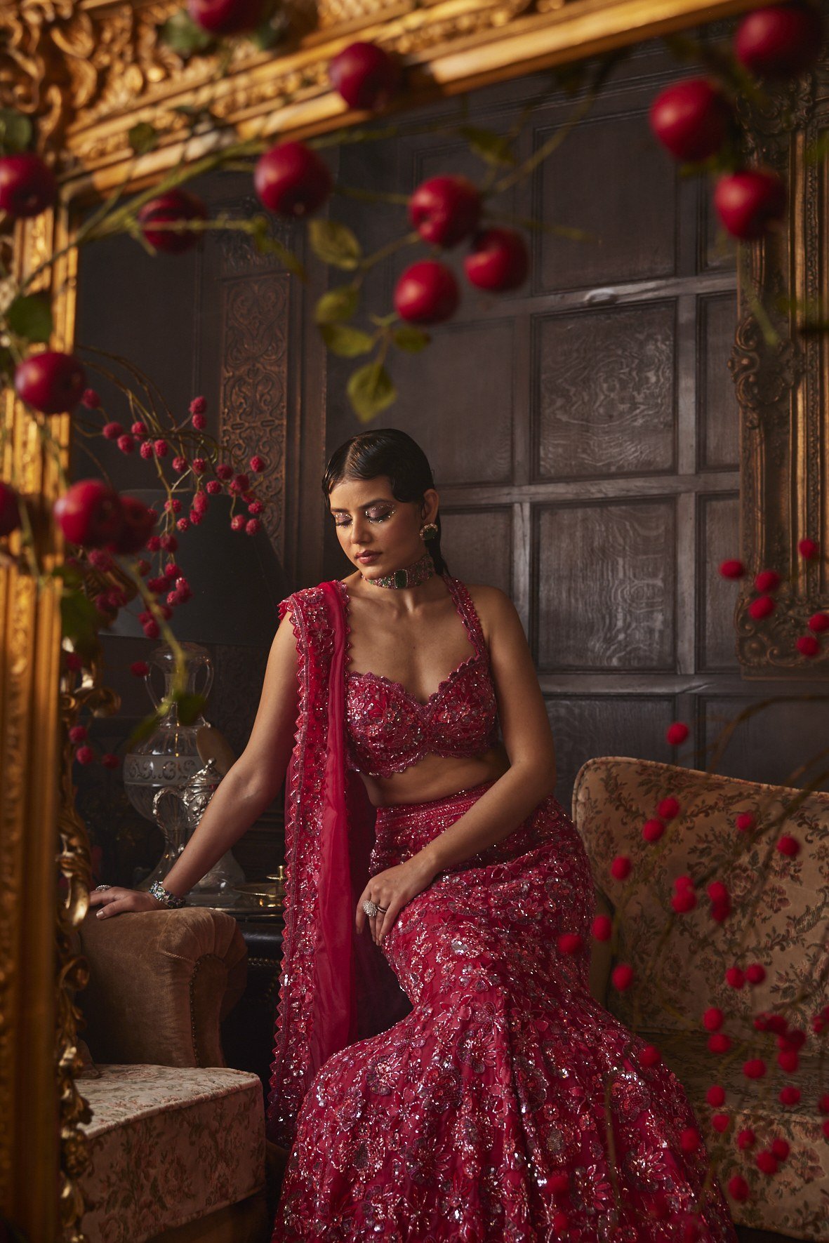 Scarlet Rose lookbook — Rani Red Lehenga Set, Rani Red · Bridal Lehenga: A rani-red lehenga set in zardozi and pearl florals, with a scalloped sweetheart blouse and a soft draping dupatta.