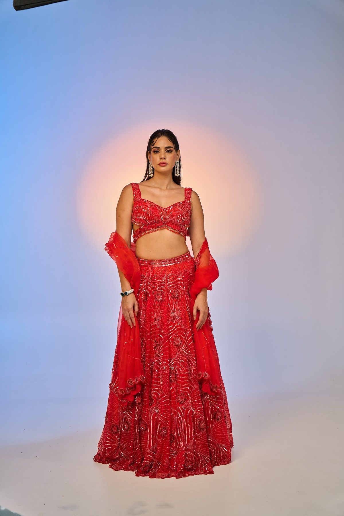 Sea Side Whispers lookbook — Red-Orange Fiery Coral, Sunfire Reef: A fiery-coral blouse with a hand-embroidered lehenga and dupatta set.