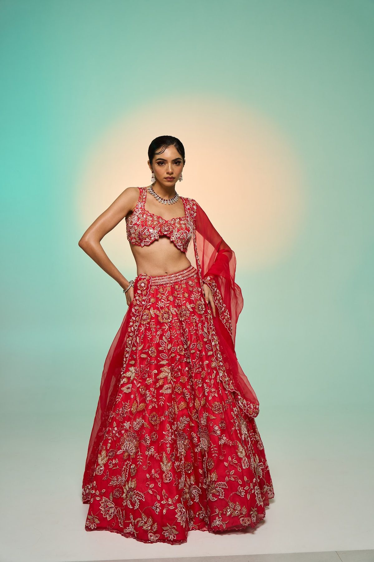 Sea Side Whispers lookbook — Cherry Red Coastal Couture, 3D Coral Dream: A cherry-red blouse with a 3D hand-embroidered lehenga and dupatta set.